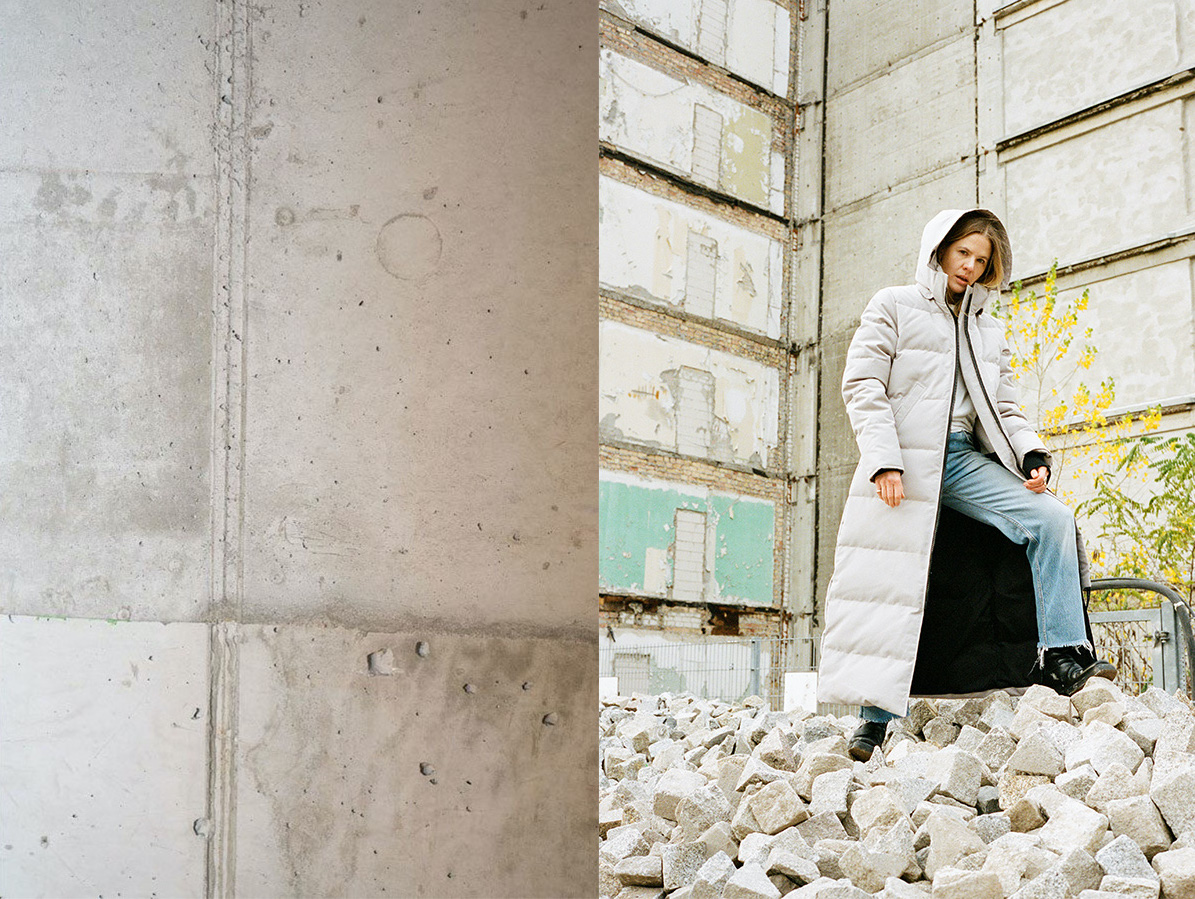 cgainoimage4 Canada Goose Editorial white puffer coat whitw wall bricks blue jeans
