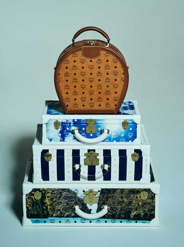 Die Wurzeln des Erfolgs_Image 01 mcm bag orange blue suitcases