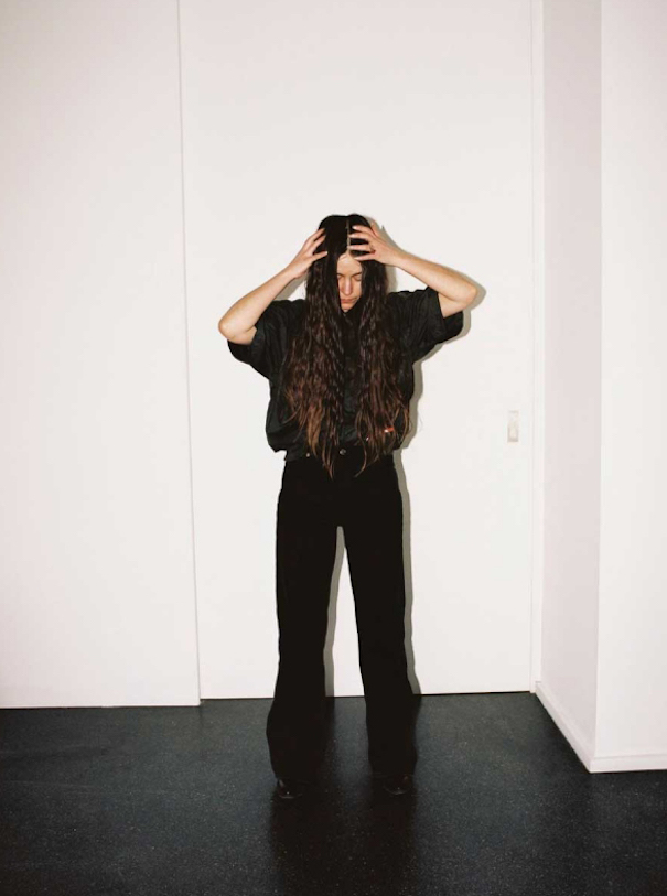 National Designer- Andra Dumitrascu is Romania_featured andra dumitrascu protrait black floor jeans long brown hair