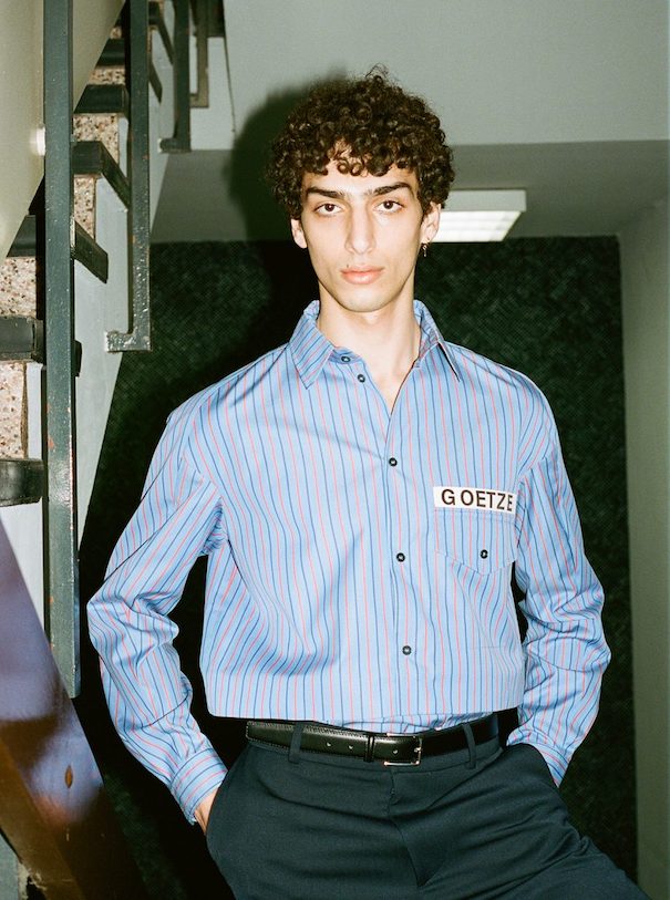 Sissi Goetze_Image2 Sissi Goetze Model Blue striped shirt hallway stairs