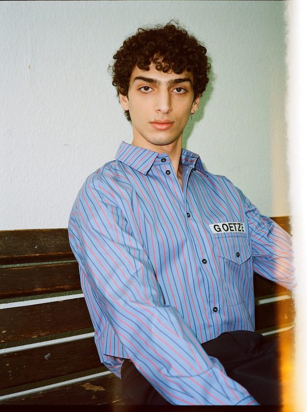 Sissi Goetze_Image4 Sissi Goetze Model Blue striped shirt hallway stairs