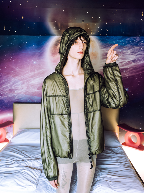 Jacket C.P. COMPANY; Bodysuit MARTIN NIKLAS WIESER