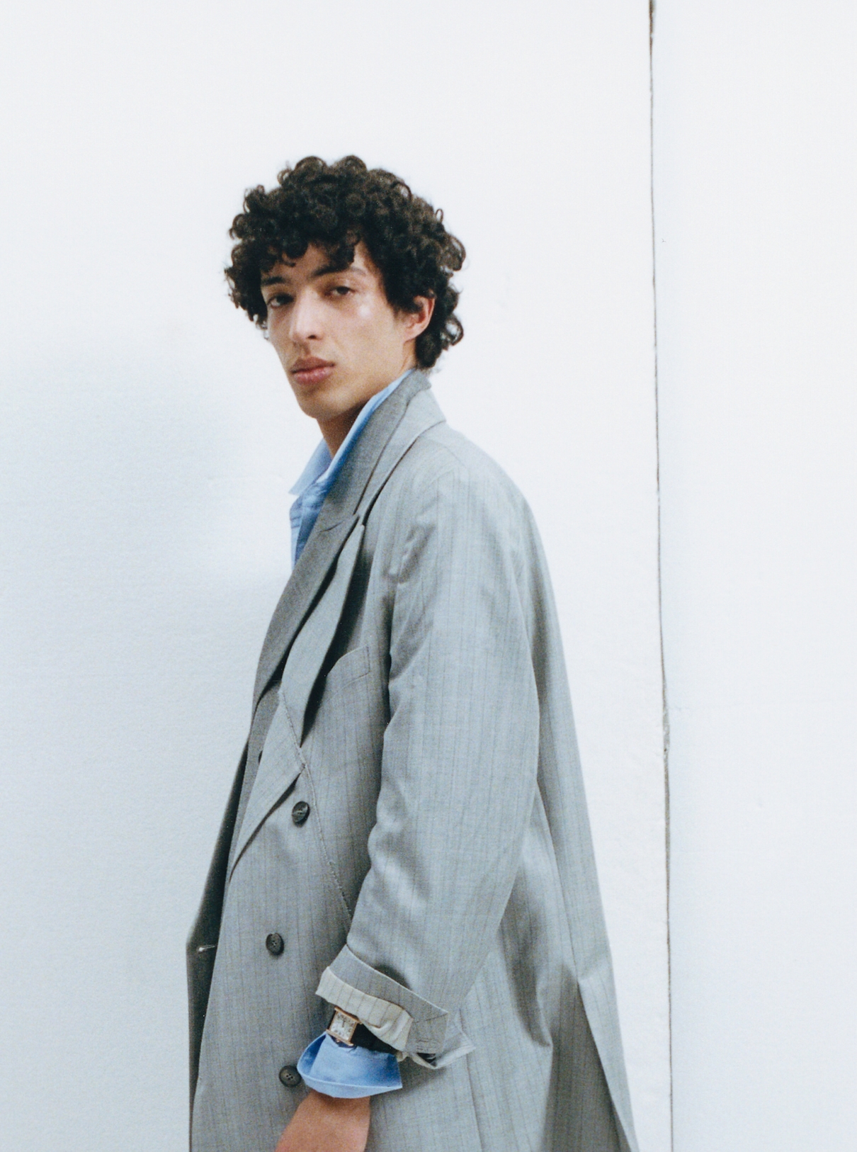 40 Jackets MOOHONG; Blue shirt COMME DES GARÇONS SHIRT; Watch CARTIER
