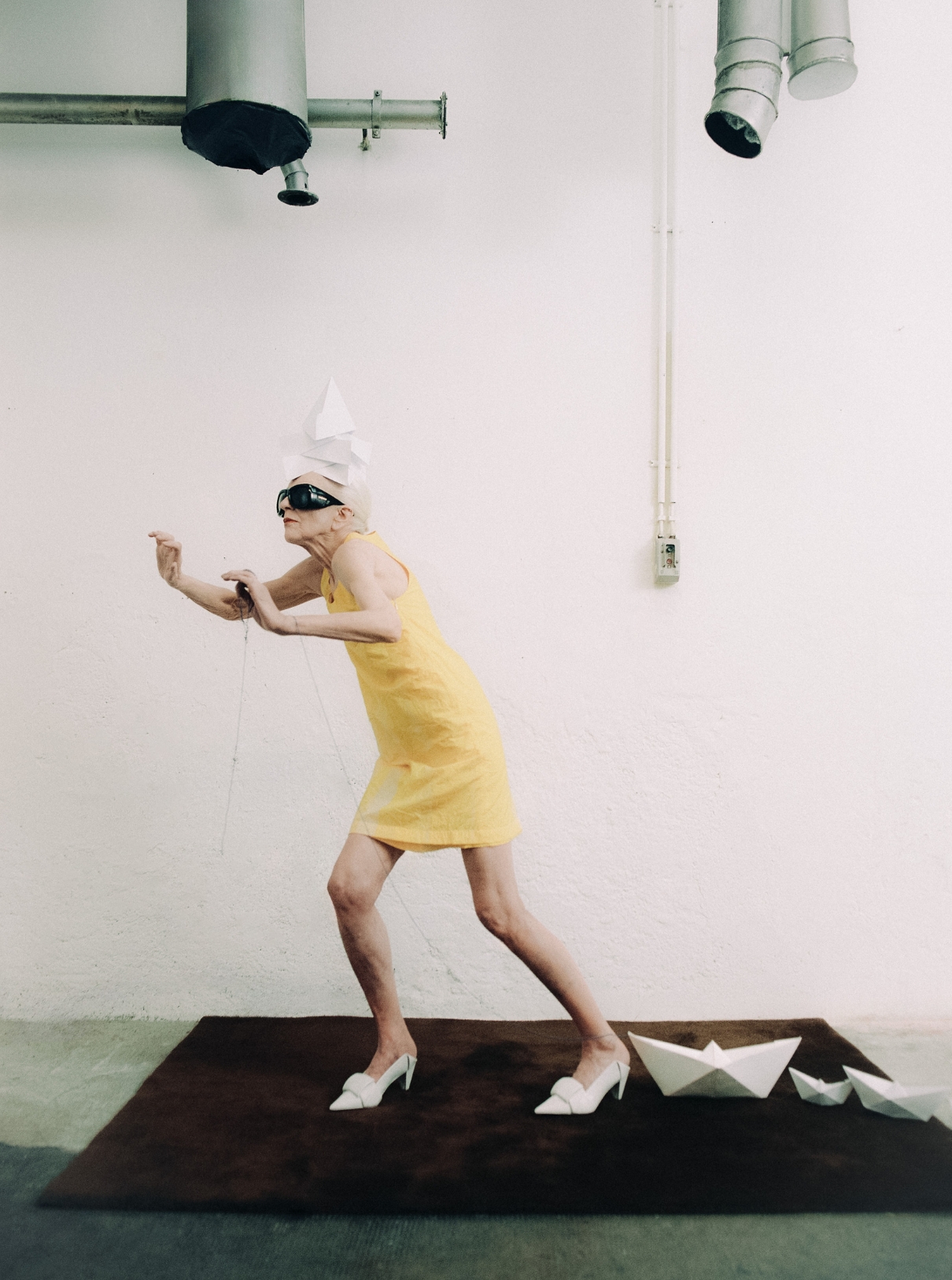 44 Dress and shoes LOEWE; Sunglasses SAINT LAURENT