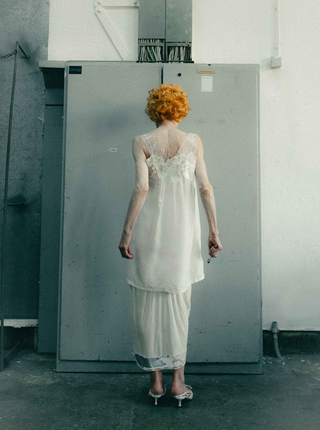 46 Dress MAISON MARGIELA; Shoes JIMMY CHOO
