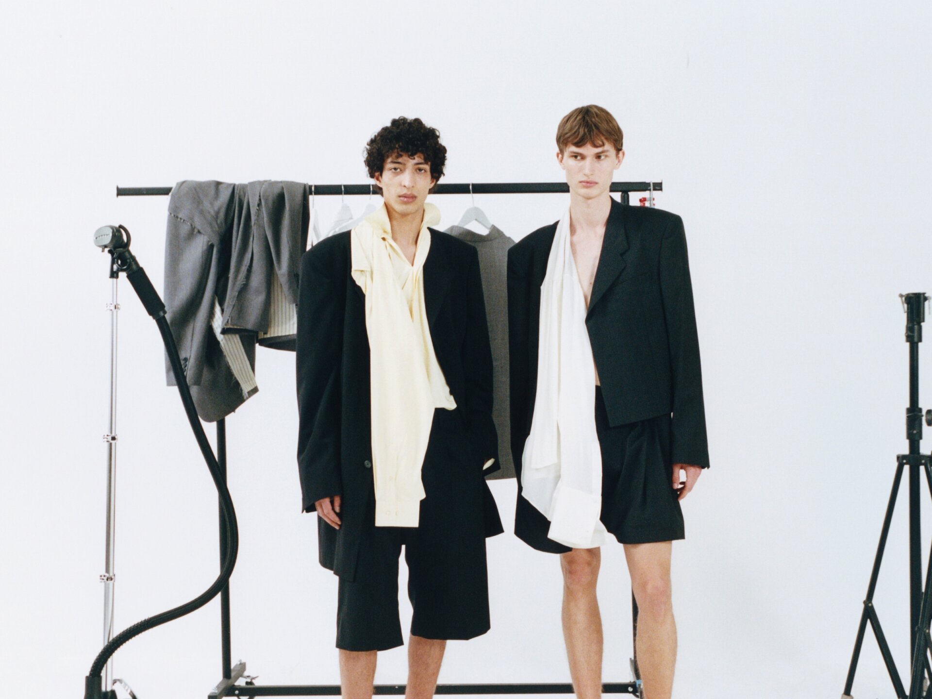 8 Male models behind the scenes wearing ALAINPAUL