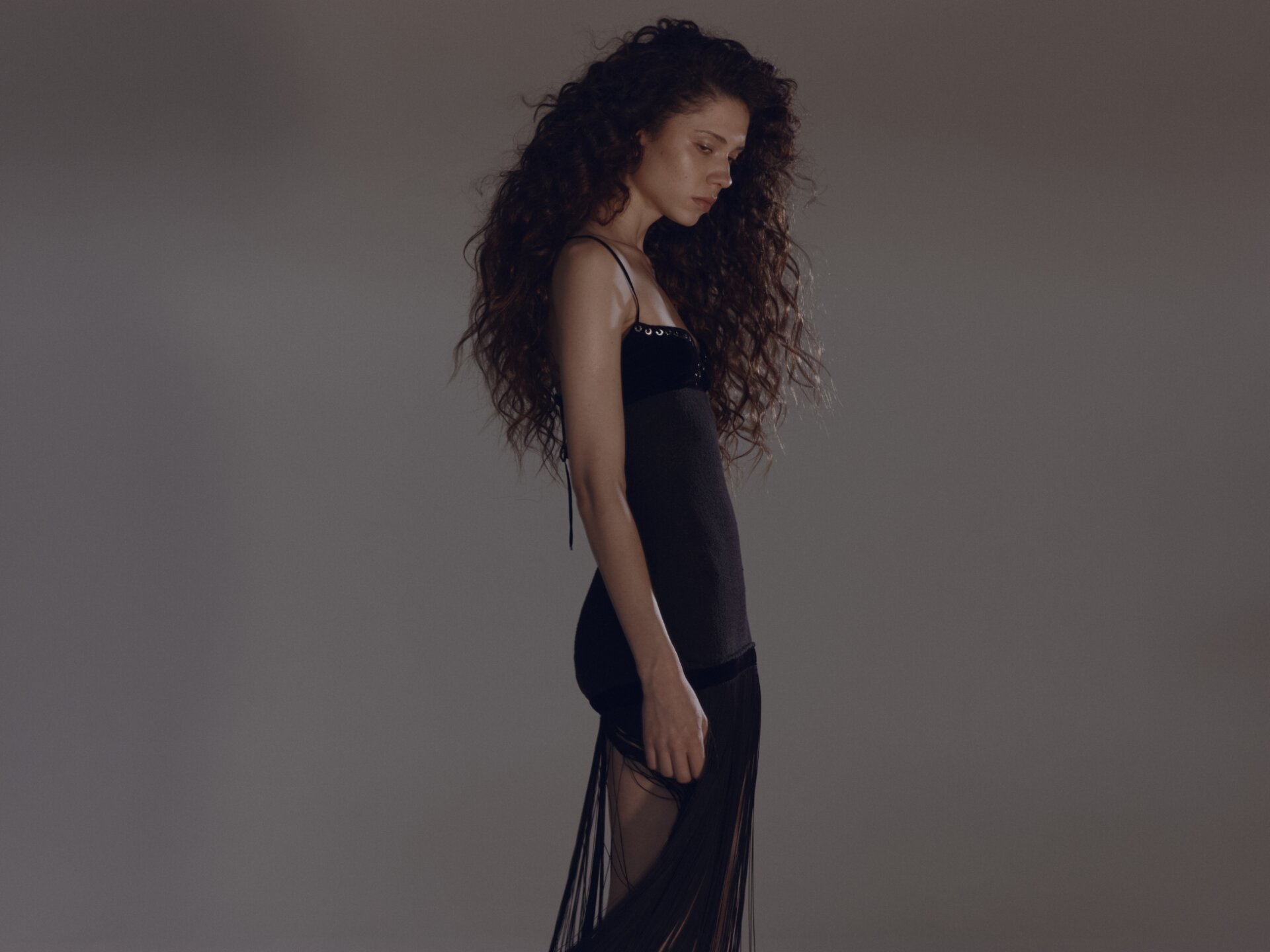 Model in candid shot wearing Dress LUDOVIC DE SAINT SERNIN